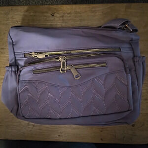 Medium size purple purse brand new